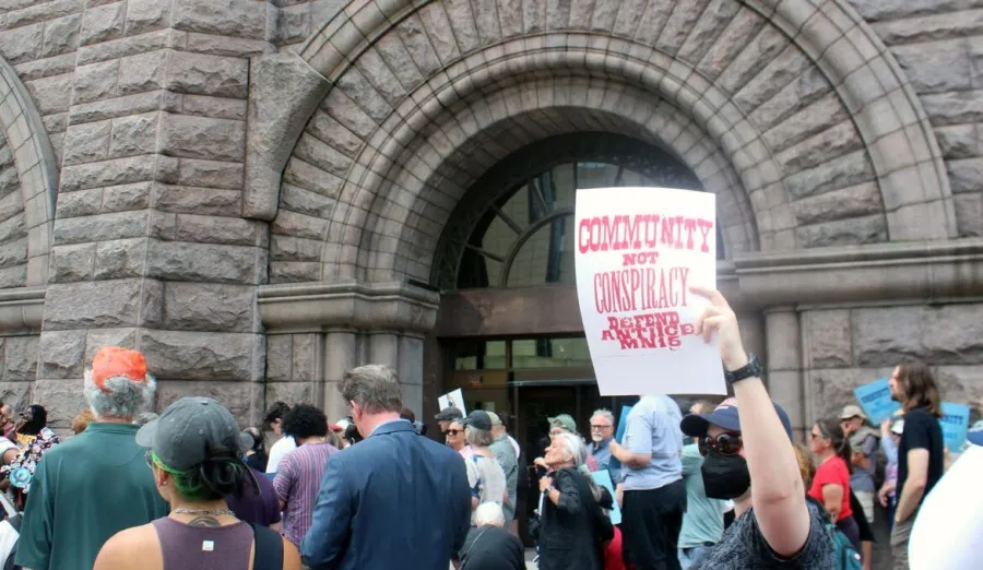 Community, not conspiracy.  Defend the anti-ICE Minnesota 15.
